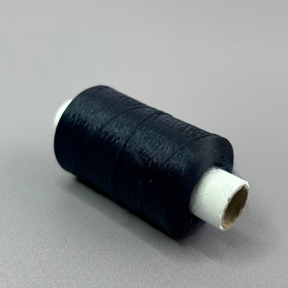 Текстуровані нитки Sindtex для оверлока 150D/1 (1000м) темно-синій
