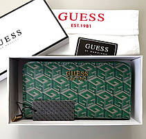 Жіночий гаманець на змійці Guess (7594) зелений