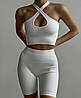 Костюм жіночий для тренувань кроп-топ з перехресними бретелями та велосипедки, фото 9