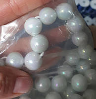 Бусини 12-мм білі на нитці "перли" (1 уп = 500 грамів = 9 м)