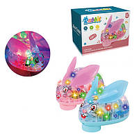 Музична іграшка кролик 14см, їздить, музика, 3Dсвітло, 2 кольори, на бат-ці, в кор-ці, 15-11-10,5см (880-6)