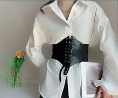 Корсети, портупеї та шкіряні гартери на тіло