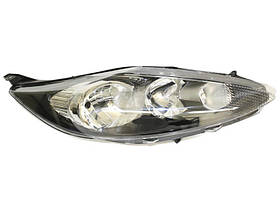 Фара права Ford Fiesta 08-13 чорн. рамка TYC 8A6113W029AJ