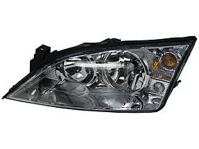 Фара ліва Ford Mondeo III 01-03 H7/H1 ел. TYC 1S7113006SA