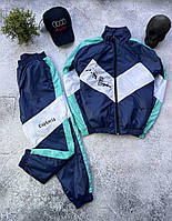 Чоловічий синій спортивний костюм з плащівки