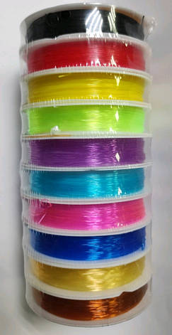 Волосінь кольорова No1950 у котушці 10 ярдів 0,8 мм (тягнеться) ціна за 10 шт., фото 1