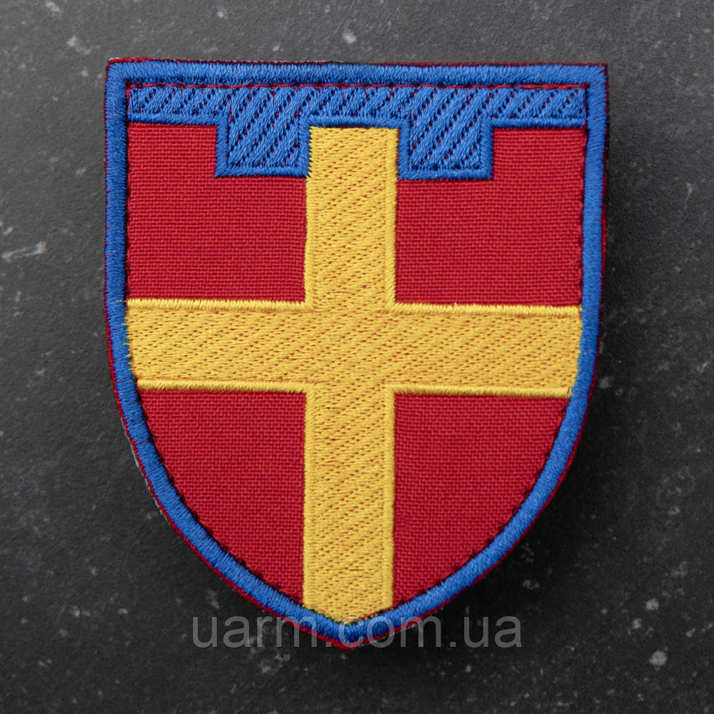 Шеврон 115 ОБрТрО