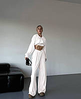 Жіночий велюровий костюм з широкими брюками