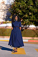 Жіночий темно-синій костюм із вкороченої кофти та пишної довгої спідниці