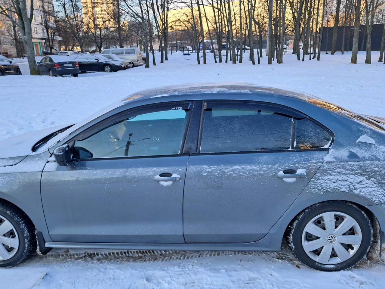 Дефлектори вікон Volkswagen Jetta 2010 (на скотчі) - Вітровики Фольксваген Джетта 6