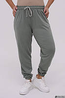 Трикотажні жіночі спортивні штани з кишенями оливкового кольору великого розміру / батал 48-50