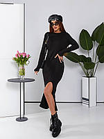 Приталена чорна сукня з розрізом на нозі та круглим вирізом довжини нижче коліна з ангори в рубчик