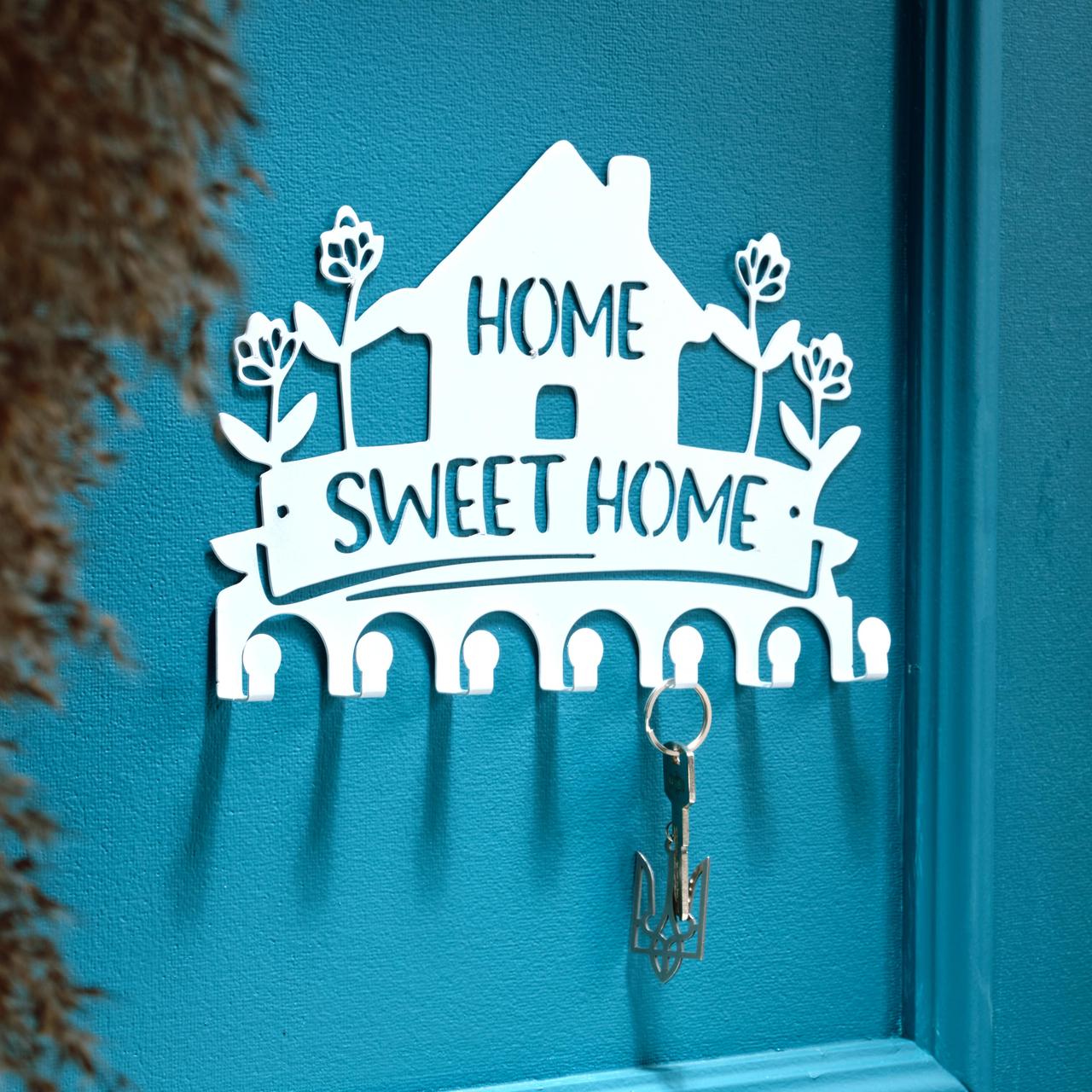 Ключниця настінна металічна 27*19см на 7 гачків Home