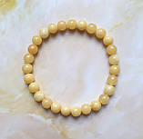 Браслет 100% натуральний цілісний природний бурштин куля 7 мм вага 5г, фото 3