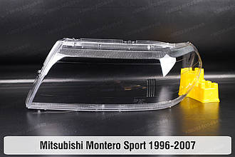 Скло фари Mitsubishi Montero Sport (1996-2007) I покоління ліве