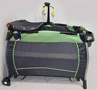 Детский манеж-кровать с пеленатором SIGMA F-R-W прямоугольный с игровой каруселью / салатовый