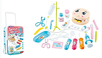 Игровой набор "Стоматолог" (26 элементов, зубная щетка и паста, шприц, щипцы, пациент, в чемодане) QY 852
