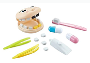 Ігровий набір "Стоматолог" (11 елементів, щипці, пацієнт, зубна паста та щітка, таблетки, у валізі) QY 853, фото 2