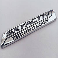 Эмблема Skyactiv 110*22 мм