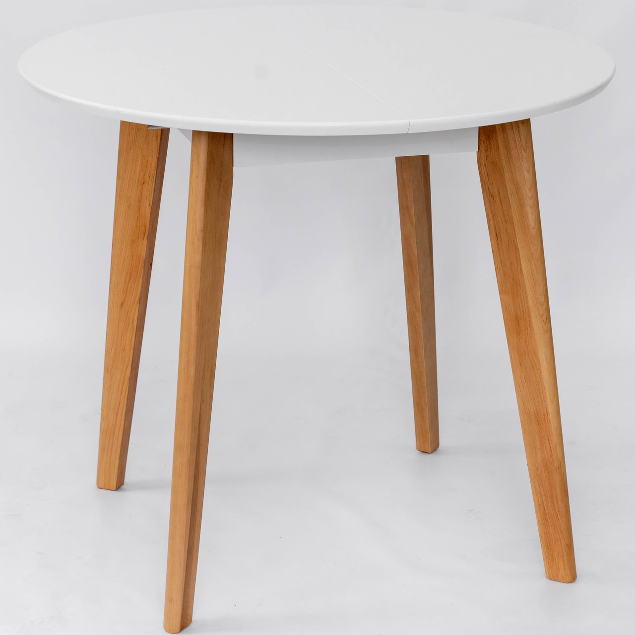 Стіл обідній розкладний дерев'яний круглий Модерн колір білий, ніжки бук ТМ Мікс Мебель