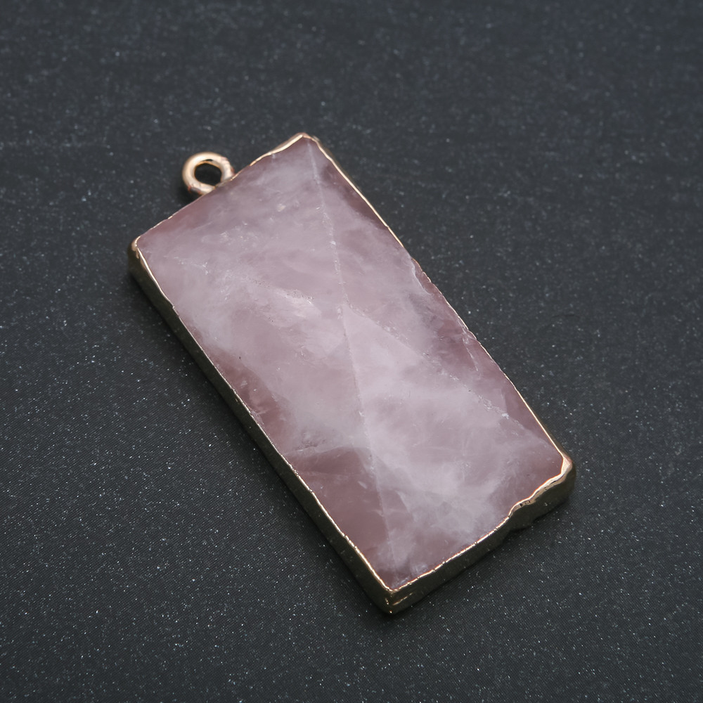 Кулон гранований в золотистій оправі з натурального каменю Рожевий кварц d-45х23мм +-