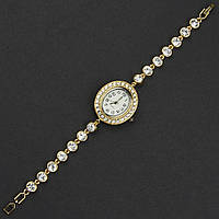 Женские часы овальные кварцевые бижутерныйл металл в серебристом цвете с белыми кристаллами длина 19 см