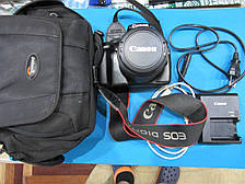 Дзеркальний фотоапарат Canon Eos 1100D з об’єктивом  Canon EF-S 18-55 mm.