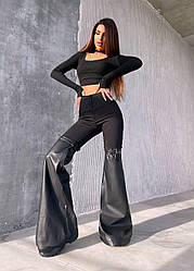 Розкльошені жіночі брюки вставки екошкіра Bb466