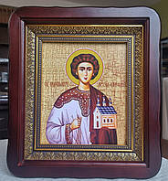 Ікона Святий мученик Стефан в темному дерев'яному фігурному кіоті під склом, розмір кіота 23*26,лік 15*18