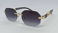 Cartier очки унисекс солнцезащитные безоправные черный градиент с золотым логотипом ягуаром