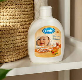 Дитячий натуральний шампунь для новонароджених гіпоалергенний без сліз Lindo з екстрактом календули
