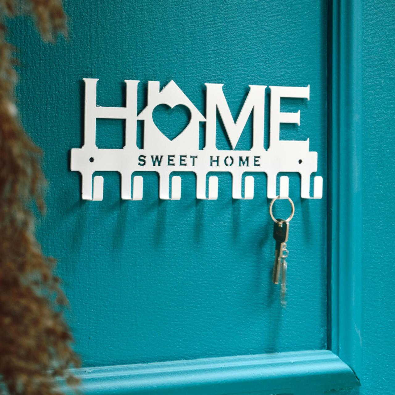 Ключниця настінна металева 27*11 см на 7 гачків Home