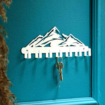 Ключниця настінна металева 27*11 см на 7 гачків Гори