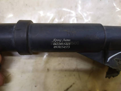 Форсунка омивача фари права NISSAN ALMERA (N16) 00-06 000047643 поломан кронштейн