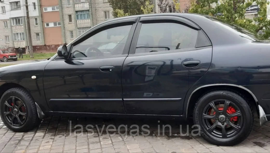 Дефлектори вікон (вітровики) Daewoo Nubira 1997-2002 (Autoclover/Корея)