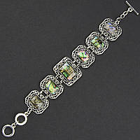 Браслет жіночий сріблястого кольору з камінням галіотіс із візерунками застібка тогл довжина 22 см ширина 28 мм