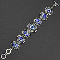 Браслет жіночий сріблястого кольору овальний оберег із візерунками застібка тогл довжина 22 см ширина 30 мм