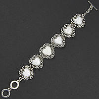 Браслет жіночий сріблястого кольору серця з білим кварцом і візерунками тогл завдовжки 22 см ширина 25 мм