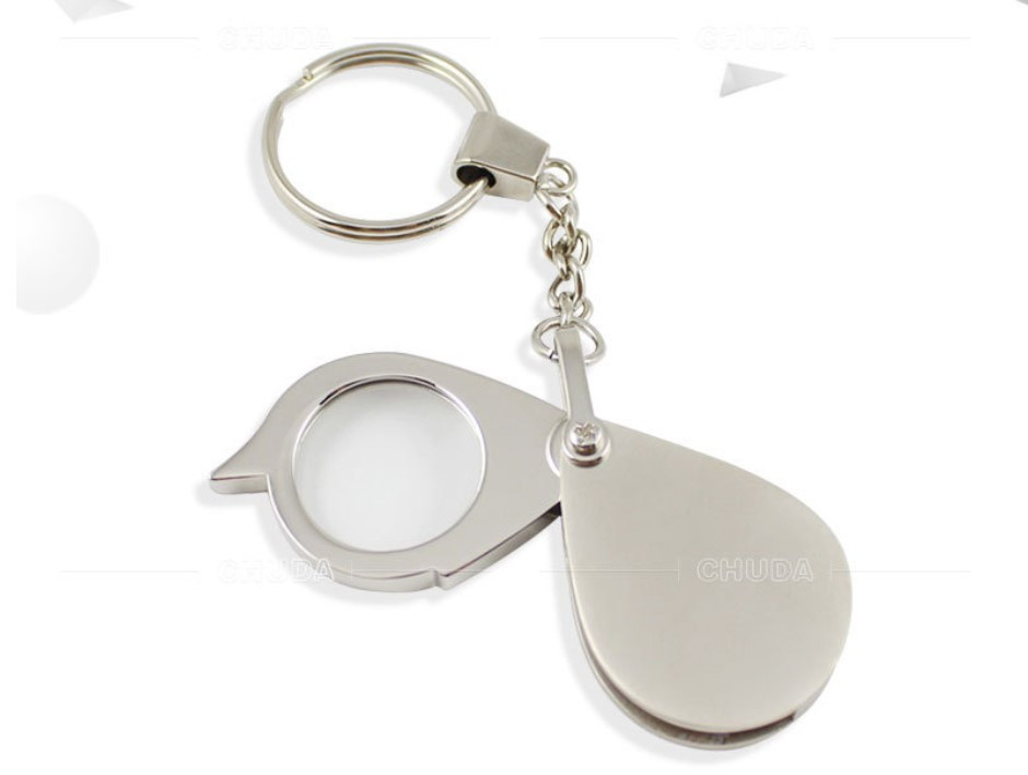 Брелок лупа 30 мм металева 1096