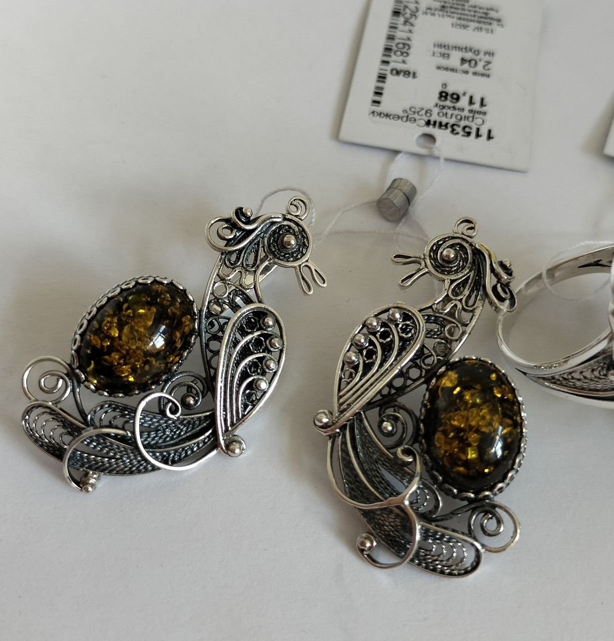 Срібні сережки жіночі із бурштином "Павич" Великі незвичайні сережки зі срібла з камінням