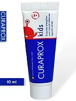 Дитяча зубна паста Curaprox 950 ppm СS Kids 2+ mini 10 мл. Без SLS |Смак полуниці, Швейцарія