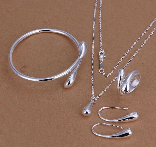 Комплект прикрас жіночий ланцюжок з кулоном, сережки, каблучка і браслет, покриті сріблом код 824