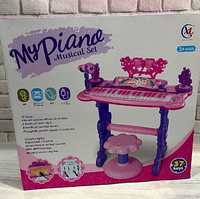 Дитячий караоке-синтезатор "Metr+ 6618" MP3 зі стільчиком мікрофоном і світловими ефектами.