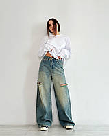 Жіночі трендові вінтажні джинси палаццо з розрізами та високою посадкою