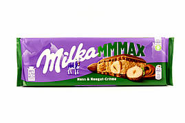 Молочний шоколад Milka Nuss&Nougat-Creme 300g (Швейцарія) поламана навпіл