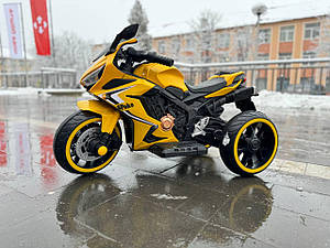 Електромотоцикл дитячий жовтий