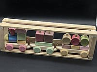 Дитяча дерев'яна іграшка "Поїзд" різнокольоровий (паровозик і два вагони) в упаковці