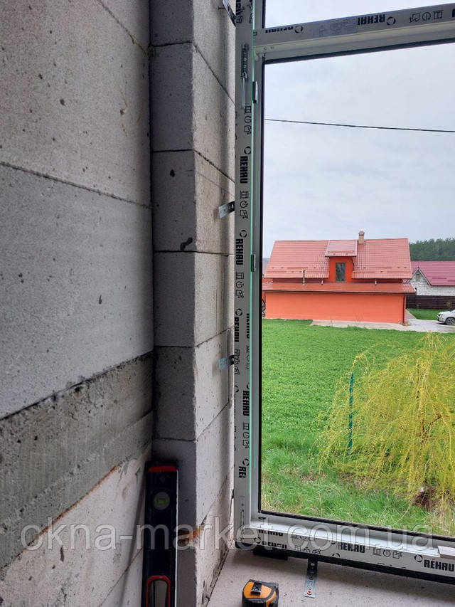 Пластикове вікно з фрамугою Rehau фото роботи ™Вікна Маркет