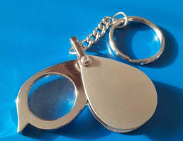 Брелок лупа 30 мм металева 1096