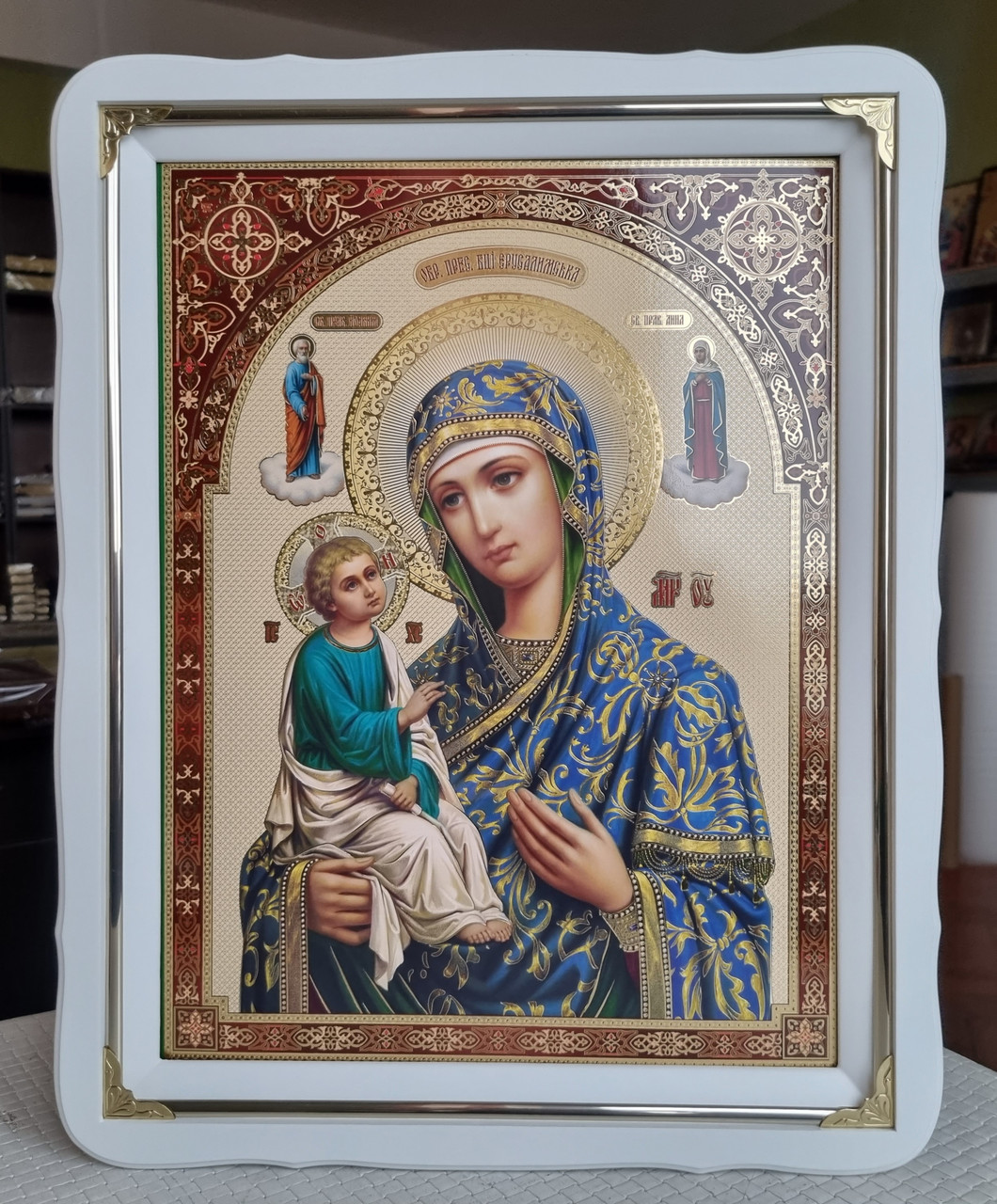 Ікона Ієрусалимська П.Богородиця в білому деревянному фігурному кіоті під склом,розмір кіота 37*47,лік 30*40